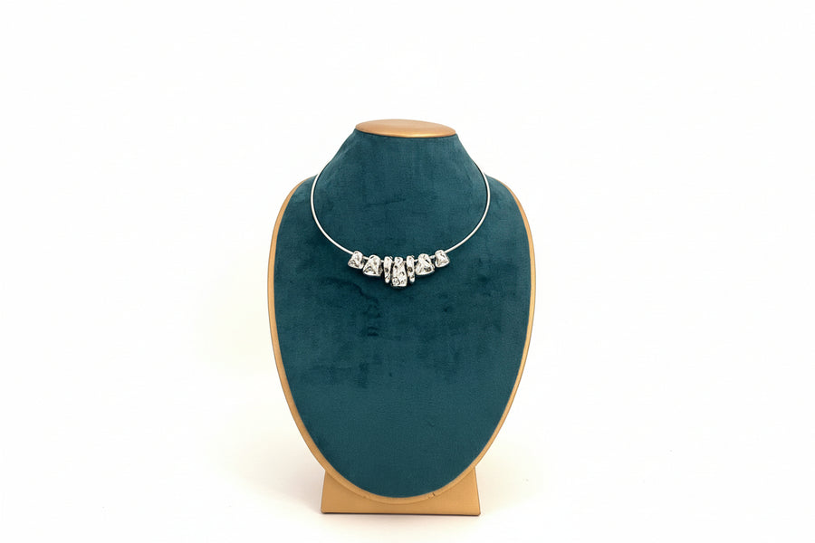 Silver necklace.
