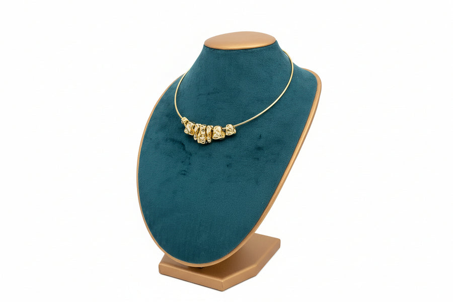 Gold necklace.