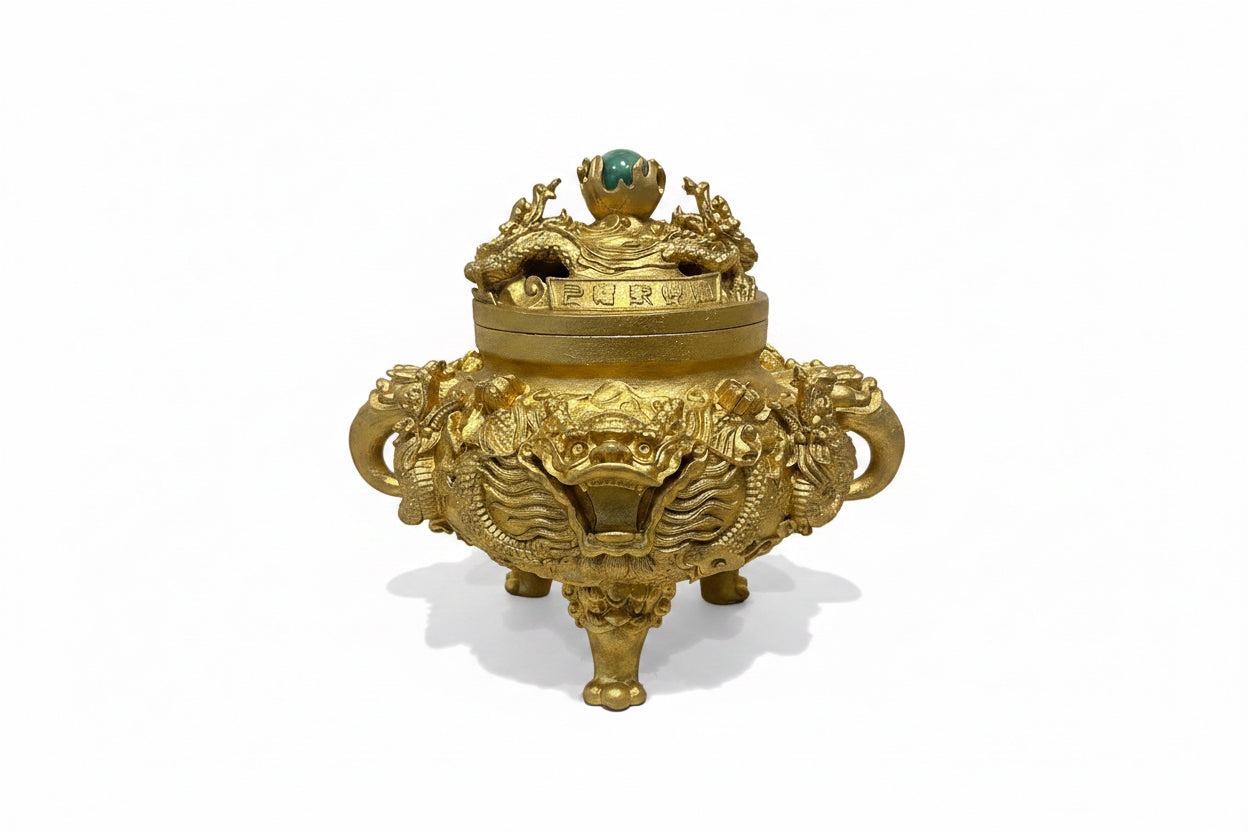 Golden sculpture with dragons by Mikita