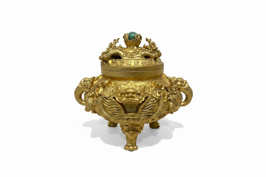 Golden sculpture with dragons by Mikita