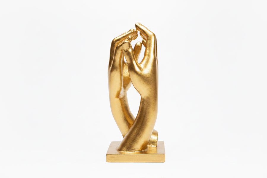 Sculpture of two hands by Mikita