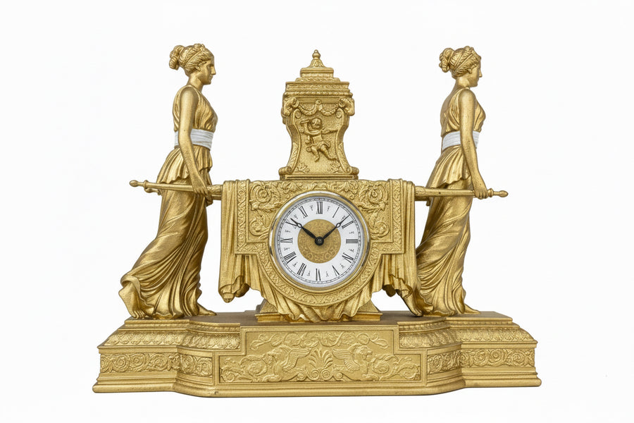 Golden sculpture of two women with a clock by Mikita